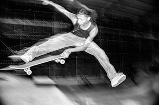 Skateboarder mid-air performing a trick