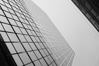 A black and white photo of tall buildings